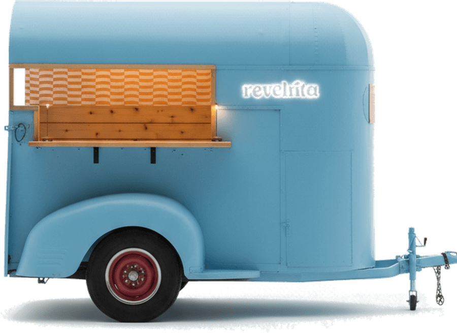 The Revelrita bar cart, a restored sky blue horse trailer